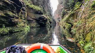 Romantic boat ride on the Kamenice River in Edmund Gorge, Bohemian Switzerland national park, Czech Republic